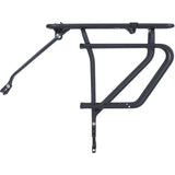 Basil Universal Cargo Carrier MIK STUDS matte black bike rack mounted on a 26-29 inch bike for carrying gear.