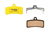 SwissStop Disc 27 brake pads for Shimano MTB ZEE, ZE, M8020 Yellow Disc RS, shown in a close-up view of the components.