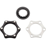 Problem Solvers Centre-Lock Hub Converter adapter for 6-bolt rotors, showing the metal component and threading for bike wheel compatibility.