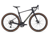 Giant Revolt Advanced 0 2024 gravel bike with Shimano GRX 820 groupset and disc brakes, shown from side view.
