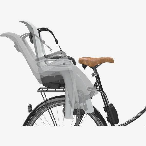 Thule RideAlong 2 rear child bike seat with adjustable straps for kids aged 9 months to 6 years, mounted on a bicycle.