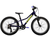 Trek Precaliber 20 Kids Mountain Bike with 7-speed gearing and parent handle for learning and trail riding, shown outdoors.