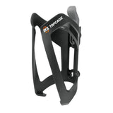 Black SKS Topcage bike water bottle holder mounted on a bicycle frame, front-loading design for easy bottle access.