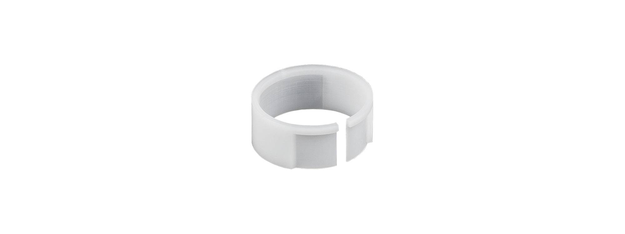 Bontrager Drop Line 10mm travel reducer spacer in white, 10mm x 25.07mm, for bicycle seatpost adjustment and components.
