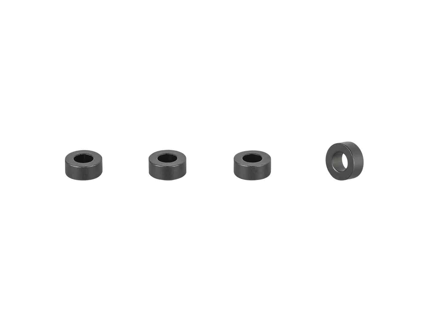 Black Trek Fetch+ 4 Spacer Kit with 12mm x 5mm spacers for bike frame alignment and stability, designed for bicycle component adjustments.