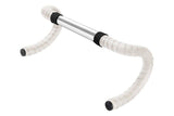 Brooks Cambium rubber bar tape with padded grip and bar end plugs for cycling handlebars.
