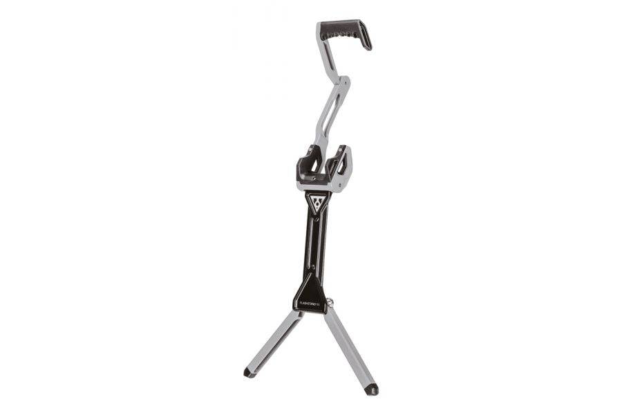 Topeak Flashstand RX folding bike stand for road bikes, black and silver, supporting 700 x 38C tires, accessory for bike maintenance.