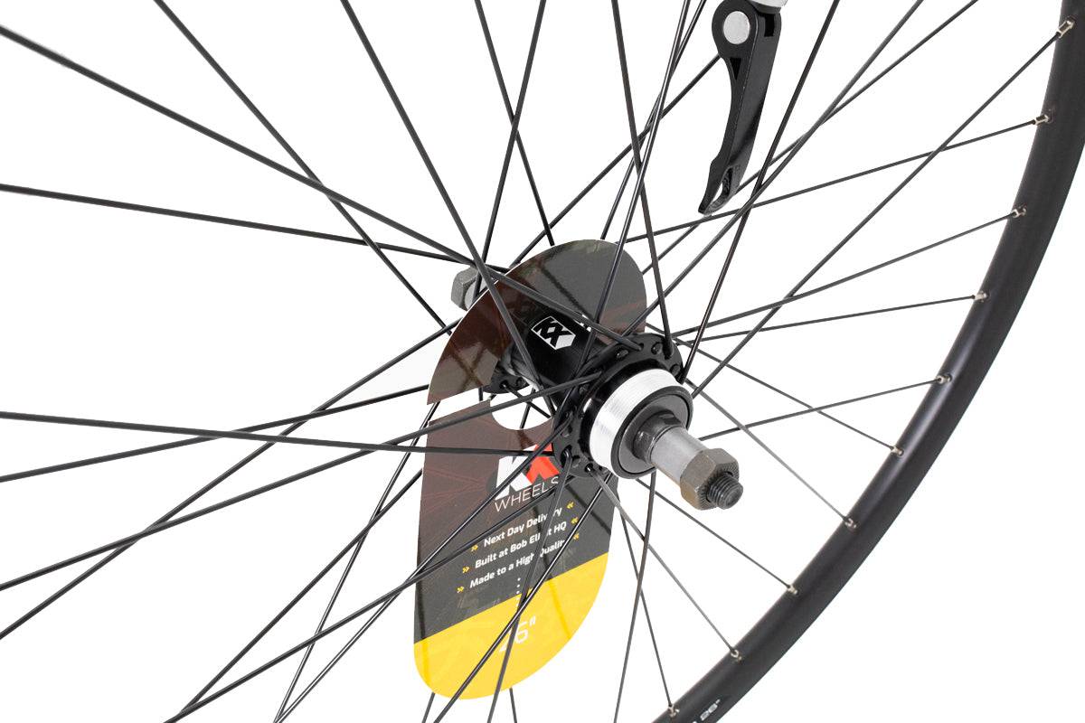 KX MTB 26-inch rear wheel with double-wall rim, quick release, screw-on freewheel, suitable for mountain bike components.