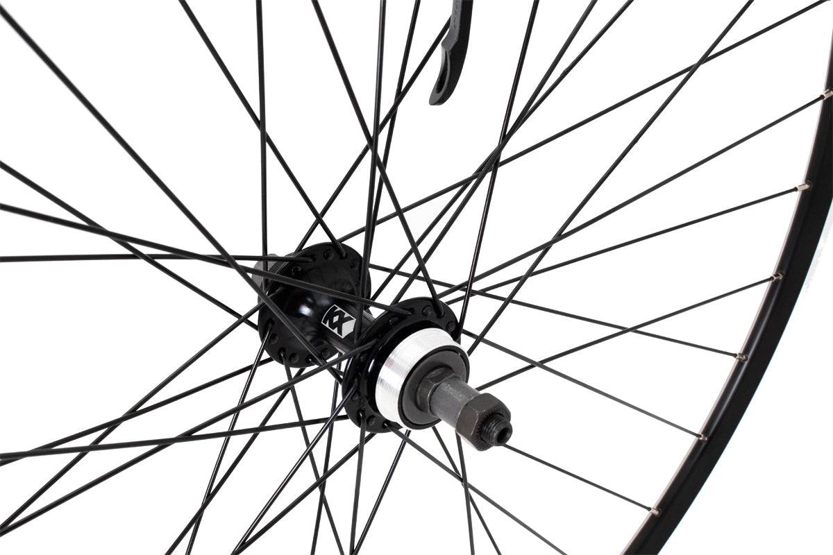 KX Wheels KX Road 700C doublewall rear wheel rim with quick release and screw-on freewheel for bicycle components.