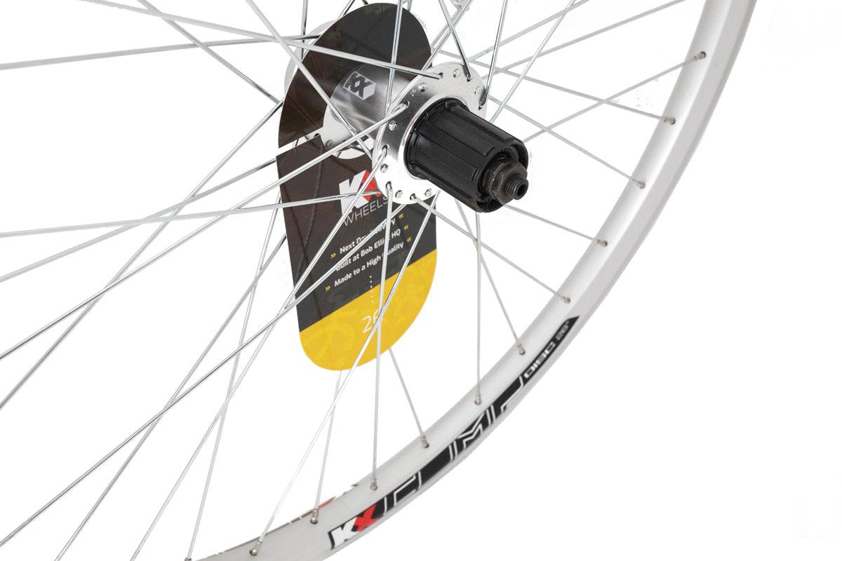 KX MTB 26-inch rear double-wall cassette wheel with disc brake and 135mm quick-release axle, showing the wheel's rim and braking surface.