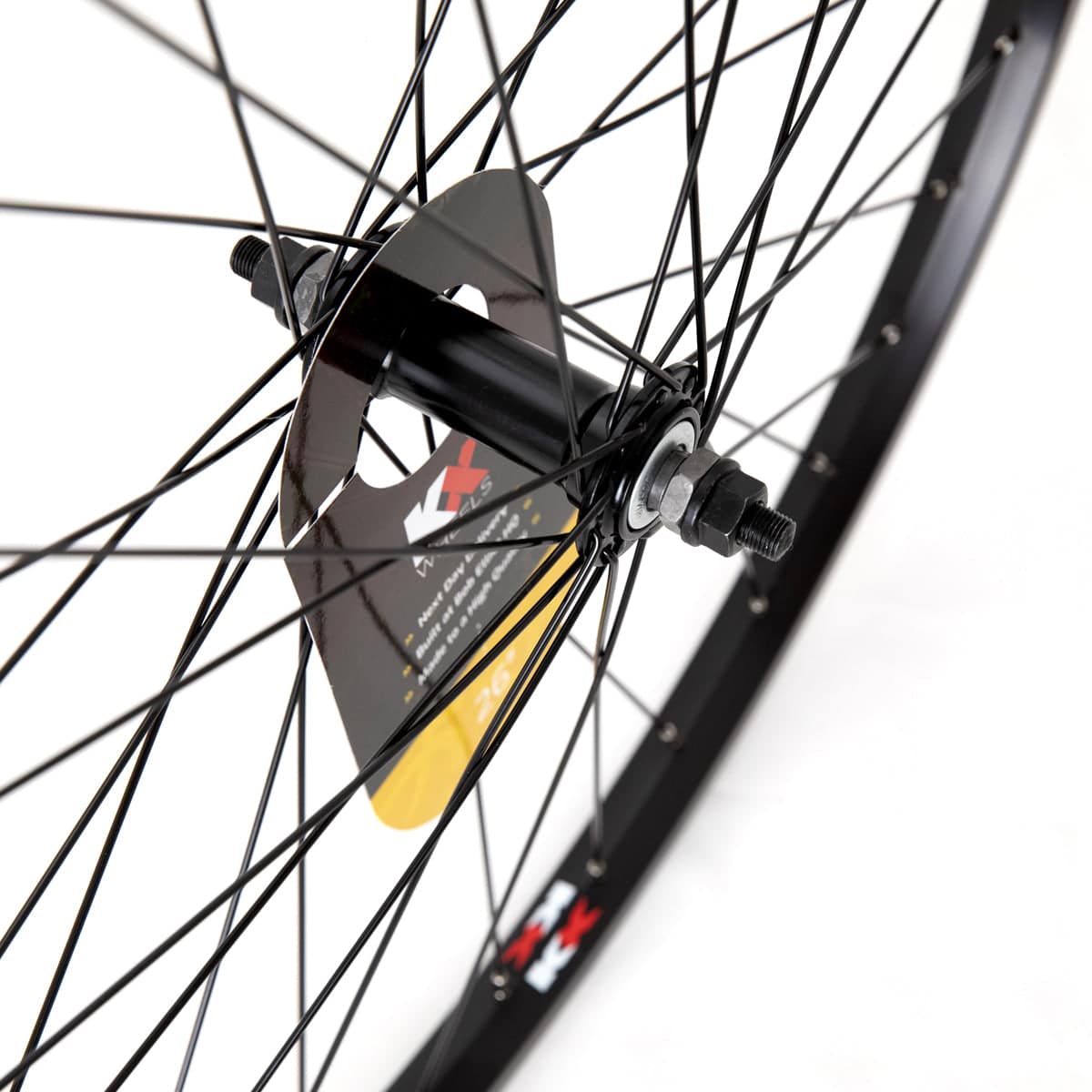 KX MTB 26-inch front wheel with singlewall rim and solid axle, 36-hole, suitable for mountain biking components.