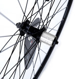 Black KX Pro Road 700C quick release sealed bearing wheel for 10-11 speed bikes, showcasing the wheel's rim and hub details.