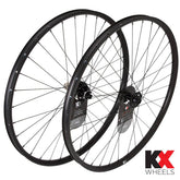 KX Pro 29-inch MTB tubeless disc wheels with 32 spokes in black and thru axle, designed for mountain biking components.