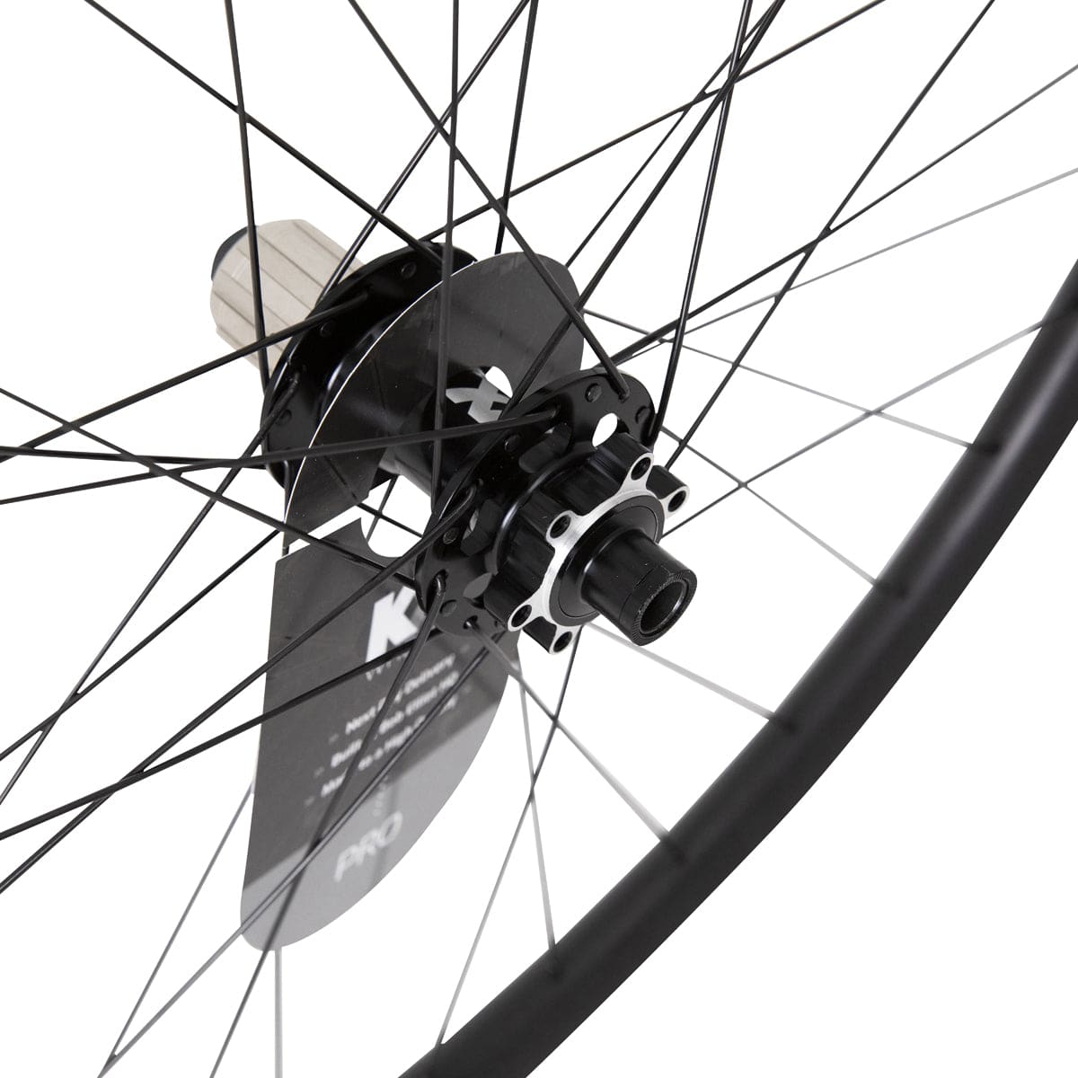 KX Pro 29-inch MTB tubeless disc wheelset with 32 spokes in black, featuring thru axle for mountain biking components.
