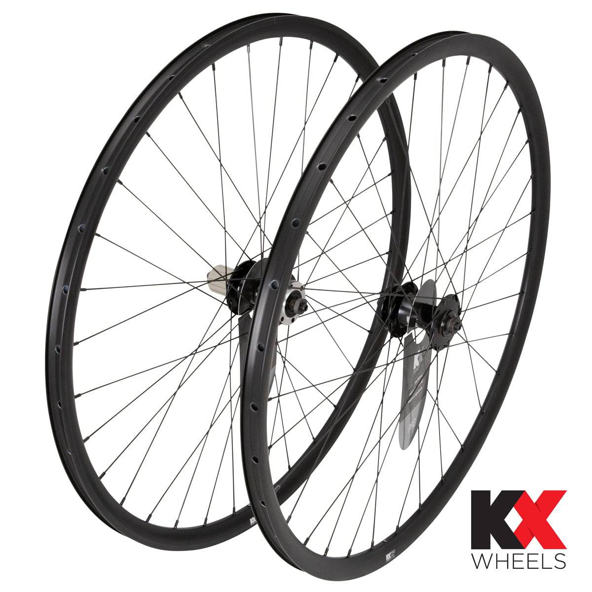 KX Wheels KX Pro Road Disc Tubeless Quick Release 700c wheels in black with accessories, showcasing sleek bike component design