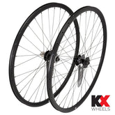 KX Wheels KX Pro Road Disc tubeless quick release wheels in black with accessories, 700c size for high-performance cycling.
