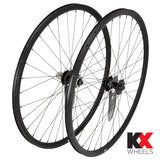 KX Wheels KX Pro Road Disc Tubeless Quick Release 700c wheels in black with accessories, showcasing sleek bike component design