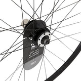 KX Wheels KX Pro Road Disc Tubeless Quick Release Wheels in black with accessories, mounted on a 700c road bike.
