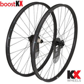 KX Pro 27.5-inch MTB boost tubeless disc wheels with rim tape and valves in black, featuring durable alloy construction.