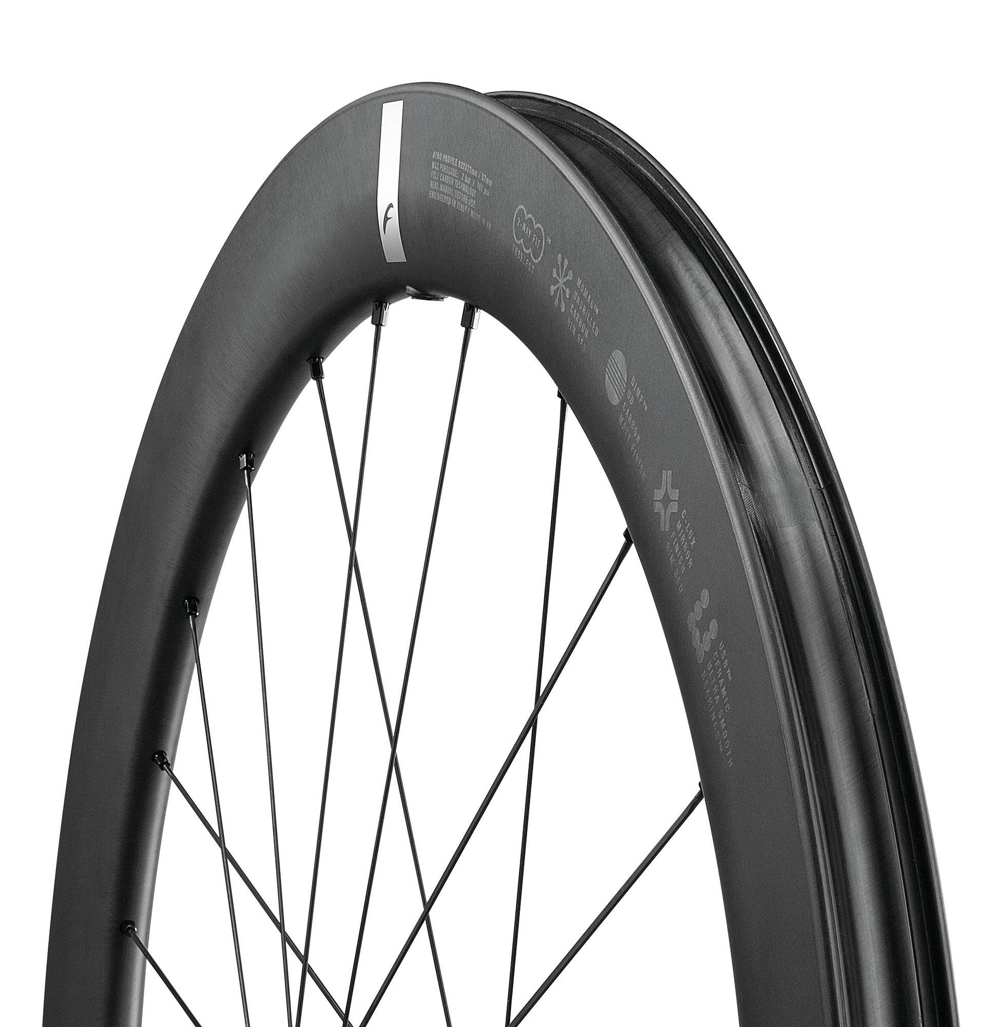 Fulcrum Speed 57 Carbon tubeless disc brake road wheelset with Shimano HG11 hubs, lightweight aerodynamic cycling components.