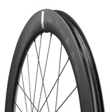 Fulcrum Speed 57 Carbon tubeless disc brake road wheelset with Shimano HG11 hubs, lightweight aerodynamic cycling components.