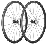 Fulcrum Soniq ALX alloy road wheelset with tubeless disc brakes and SRAM XDR freehub, showcasing lightweight alloy rims and disc rotors.