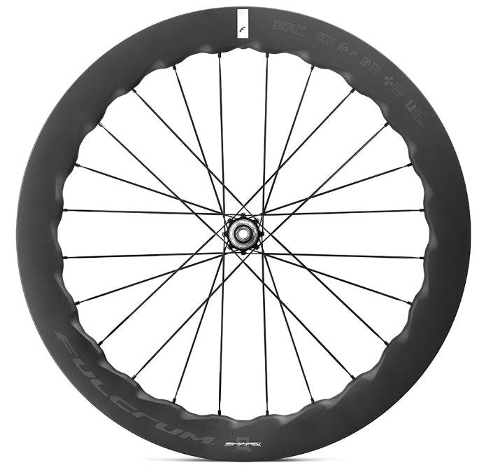 Fulcrum Sharq 57 Carbon Tubeless Disc Brake Road Wheelset with Shimano HG11 compatibility, featuring lightweight carbon rims and disc hubs.