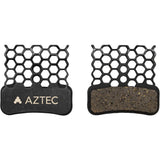 Aztec HexVent disc brake pads for Shimano Saint with advanced heat management, showing the brake component with textured surface.