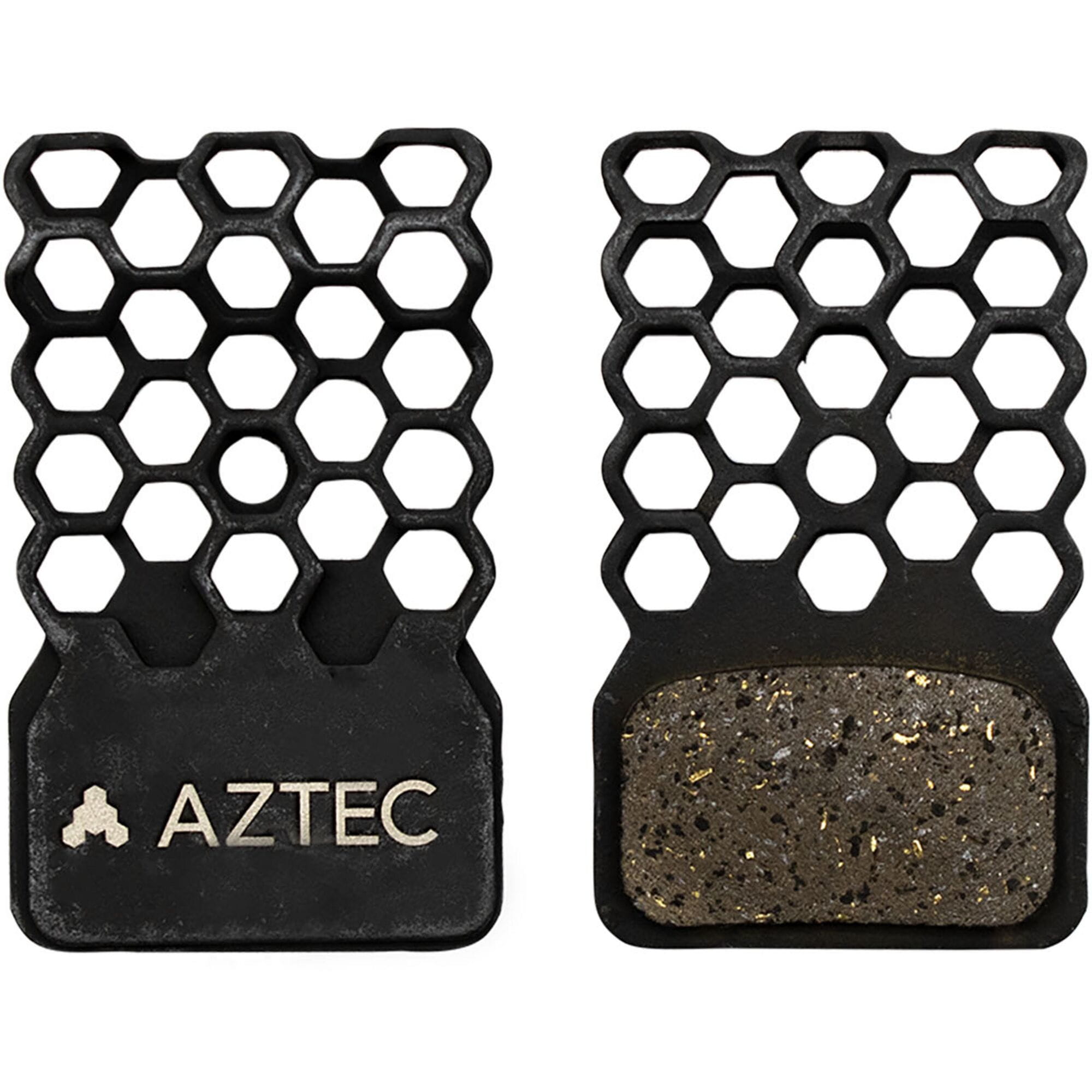 Aztec HexVent disc brake pads for Shimano flat mount calipers with heat control, shown in a close-up of the automotive components.