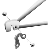Silver anodised M Part gear hanger with felt padding for bike frame protection, designed for easy installation on bike components.