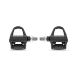 Garmin Rally RK110 single-sensing power meter cycling pedals with black and silver design, showing pedal body and cleat interface.