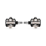 Garmin Rally XC110 single-sensing power meter pedals with Shimano SPD compatibility, showing pedal and cleat connection.