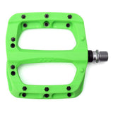 HT Components PA-03A flat pedal with green body, replaceable pins, and Cro-Mo axle for mountain biking or BMX riding.