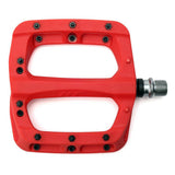 Red HT Components PA-03A flat pedal with replaceable pins and Cro-Mo axle, shown with a durable metal design and textured platform.