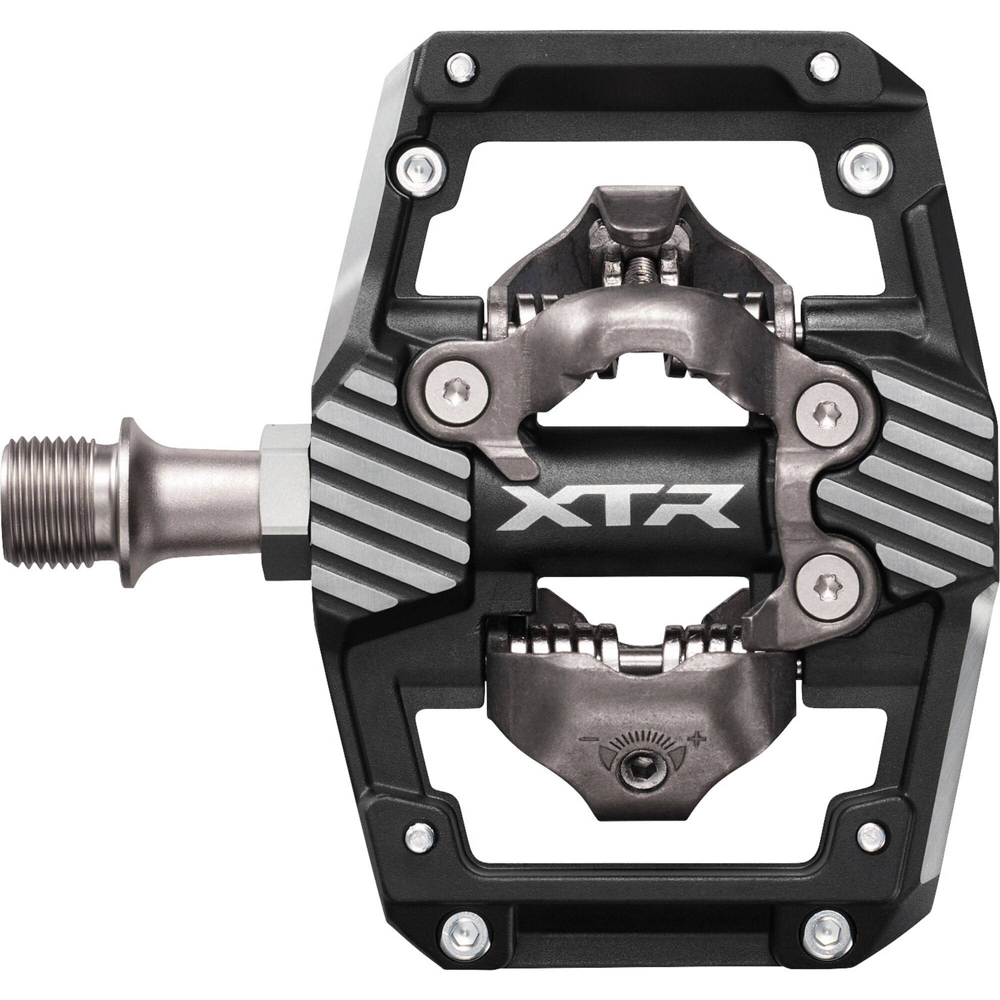 Shimano XTR PD-M9220 Trail Wide Platform Pedals for mountain biking, showing durable metal pedals with wide grip surface.