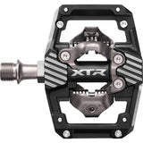 Shimano XTR PD-M9220 Trail Wide Platform Pedals for mountain biking, showing durable metal pedals with wide grip surface.