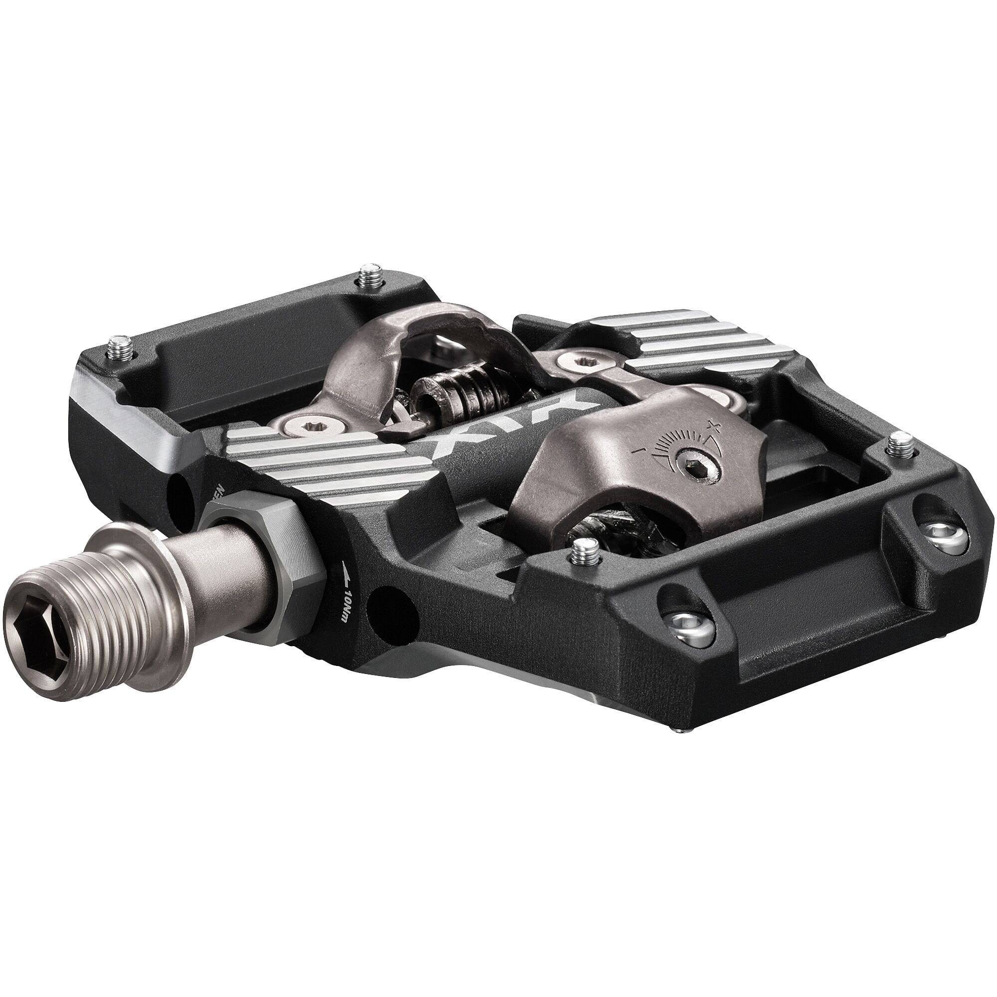 Shimano XTR PD-M9220 trail wide platform mountain biking pedals with durable metal body and cleat compatibility.