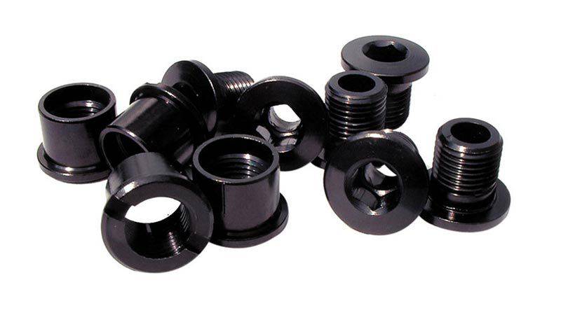 Set of five ID stainless steel chainring bolts, double size spares and accessories for bike components, shown in a close-up image.