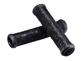 Giant Tactal mountain bike grips with multi-striped vibration-reducing design, featuring ergonomic rubber for comfortable handling.