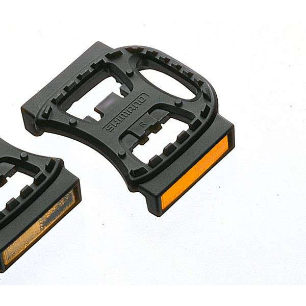 Pair of Shimano SM-PD22 reflector units for bike safety, genuine Shimano spare components, shown with reflective surfaces.