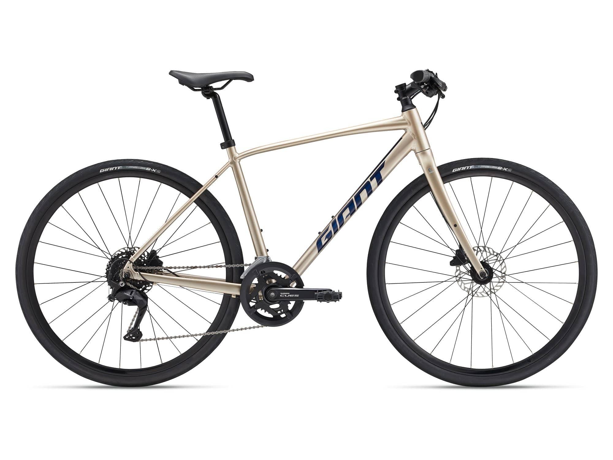 Giant Escape Disc 1 hybrid bike unisex with Shimano CUES U3000 drivetrain, featuring a sleek frame and disc brakes.