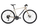 Giant Escape Disc 1 hybrid bike unisex with Shimano CUES U3000 drivetrain, featuring a sleek frame and disc brakes.