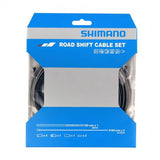 Shimano road gear cable set with stainless steel inner wire and black outer casing for smooth shifting.