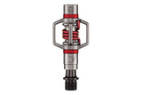 Crankbrothers Eggbeater 3 silver and red MTB pedals with mud-shedding design, showcasing lightweight components for mountain biking.