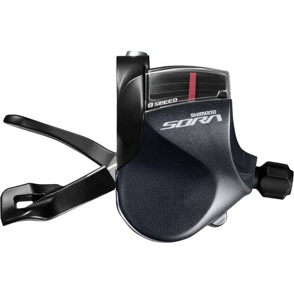Shimano Sora SL-R3000 road shifters for flat bars, 9-speed Mega9 triple chainset, close-up of black components and gear levers.