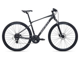Giant Roam 4 MY26 hybrid bike with suspension fork and disc brakes, suitable for commuting and trail riding.