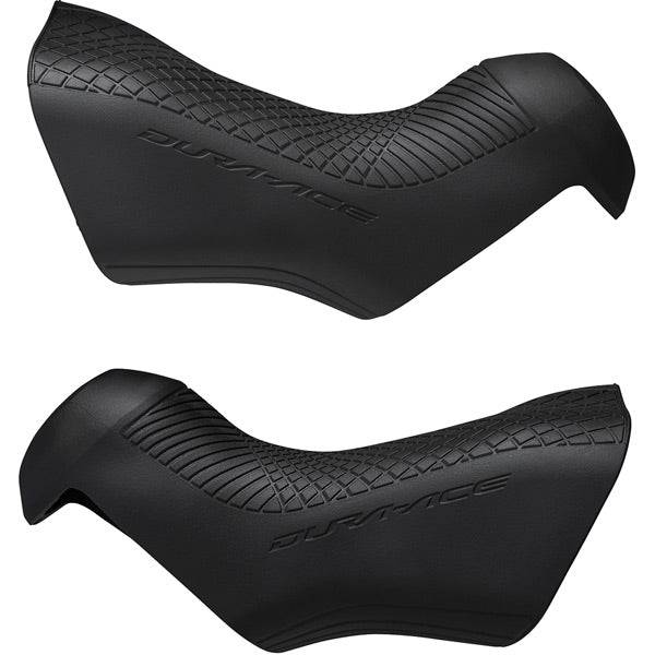 Pair of Shimano Dura-Ace ST-R9170 brake lever bracket covers, genuine replacement components for road bike shifters.