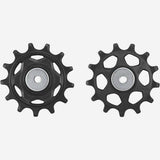 Shimano CUES RD-U6000 rear derailleur tension and guide pulley set for bike components, with metal and plastic parts.