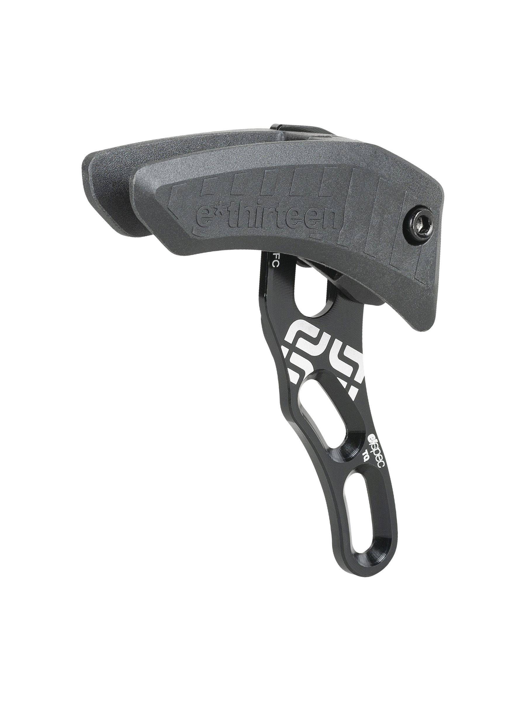 Trek Fuel EXe e*Thirteen black chainguide for chain stability, designed for bike components, shown on a black background.