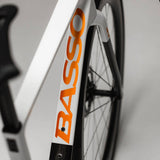 Basso SV Burano white road bike frameset with integrated handlebars and aerodynamic design, showcasing sleek, lightweight cycling components.
